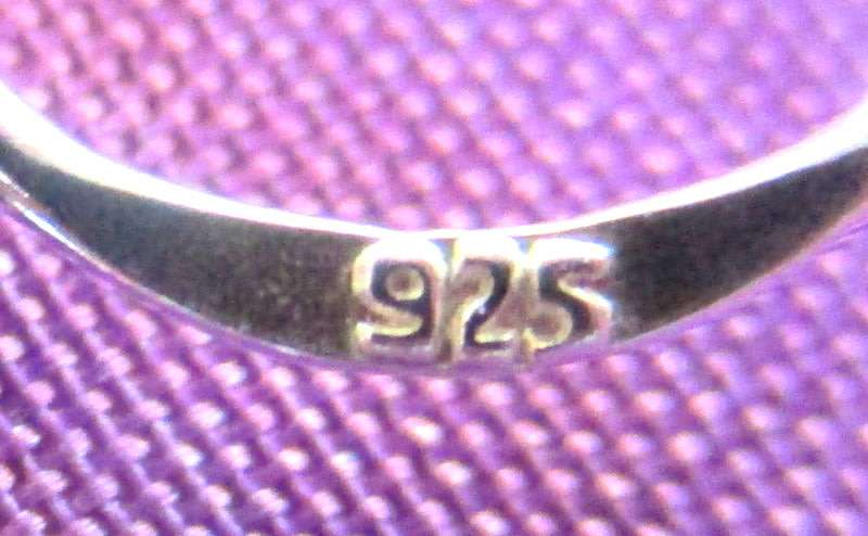 A PAIR OF SOLID SILVER EARRINGS---NEW