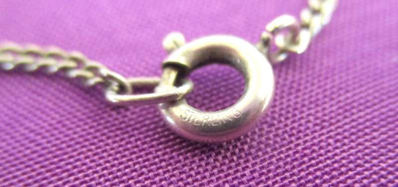 A WELL MADE VINTAGE STERLING SILVER ST.CHRISTOPHER ON A LONG CHAIN