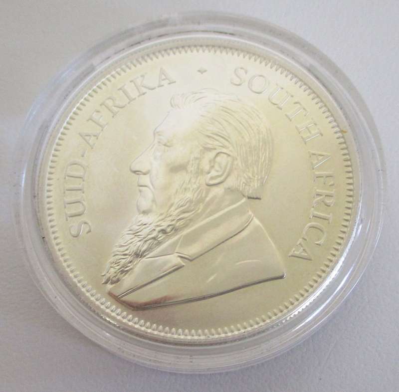 A 2017 KRUGER 1 OUNCE SILVER RAND IN A SEALED CAPSULE