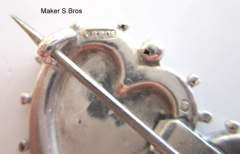 A HALLMARKED SILVER MIZPAH BROOCH--1911-1912