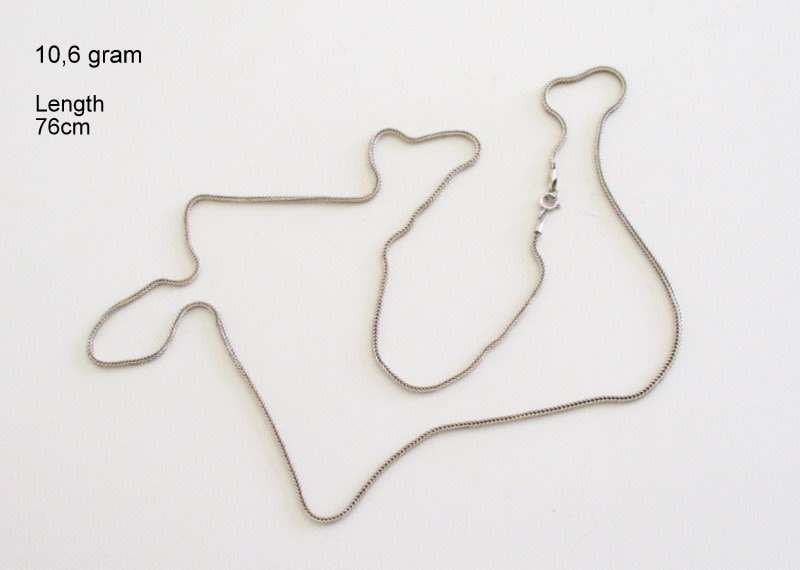 A VERY LONG ANTIQUE ,925 SILVER CHAIN AND AN ANCIENT MUSEUM REPLICA COIN ,500 SILVER