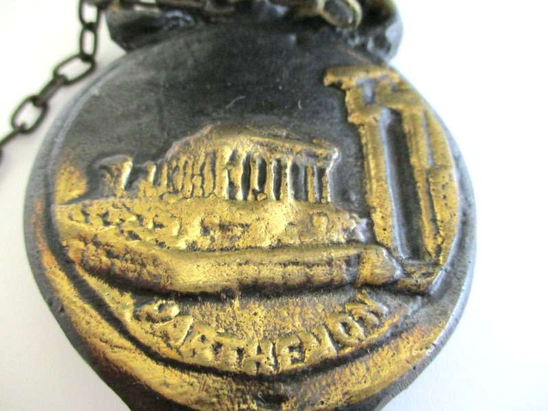 A VINTAGE METAL BELL