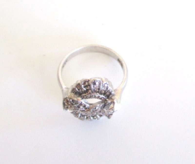 A STERLING SILVER MARCASITE BROOCH AND SILVER MARCASITE RING-COMBINED WEIGHT-14,8gram