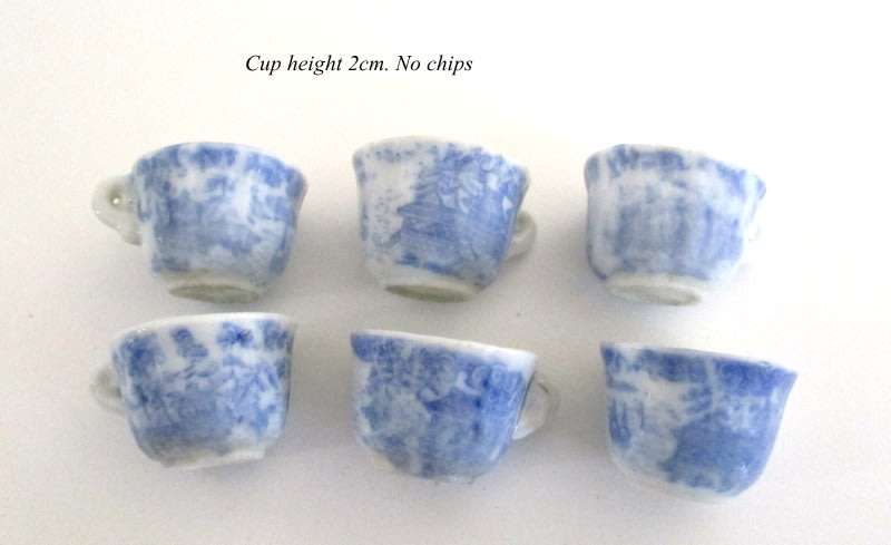 A VICTORIAN SALESMAN'S SAMPLE  PORCELAIN TEA SET ON A TRAY--READ