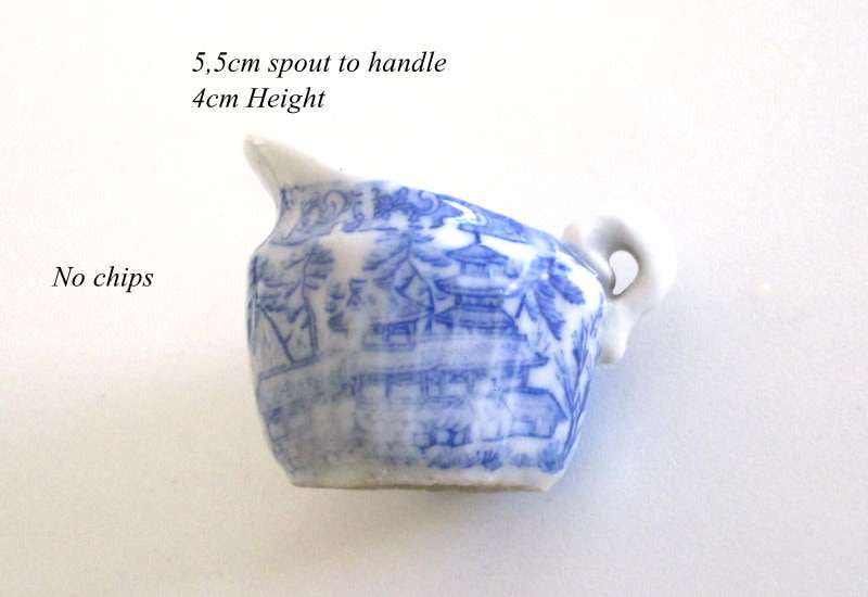 A VICTORIAN SALESMAN'S SAMPLE  PORCELAIN TEA SET ON A TRAY--READ
