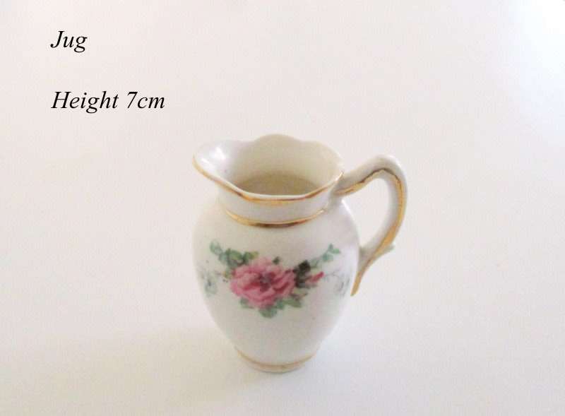 A MINIATURE TO SMALL PORCELAIN CHAMBER SET--PERFECT