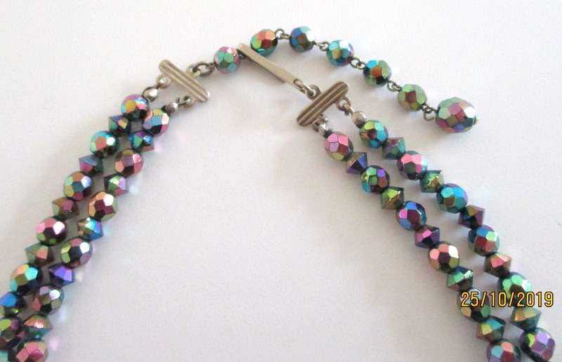 A VINTAGE 2 STRING MULTI-COLOURED CRYSTAL BEADED NECKLACE