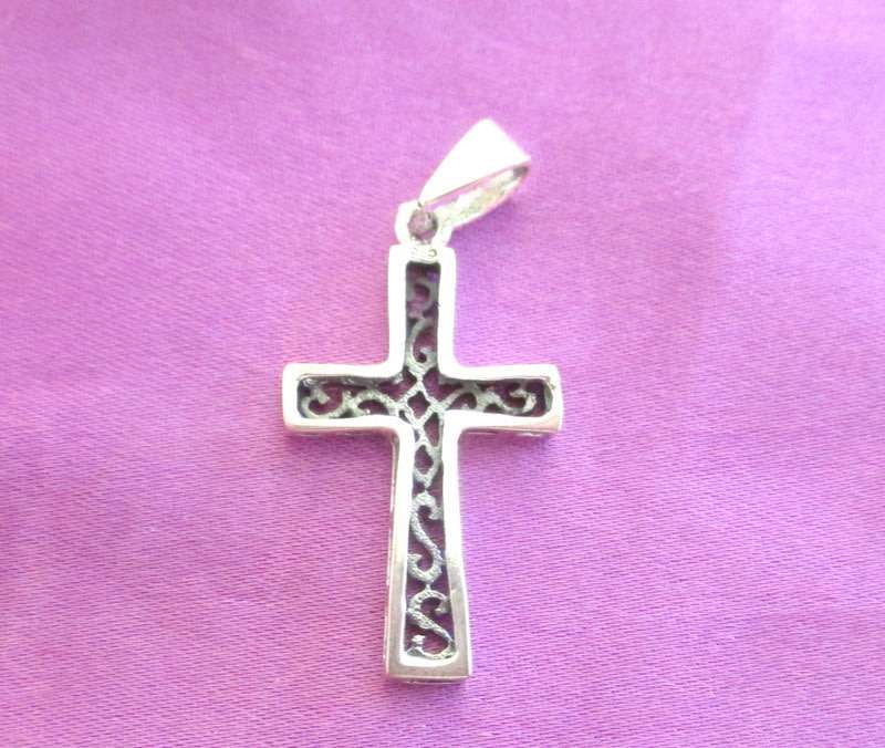 A STERLING ,925 SILVER CROSS--Check your load shedding times