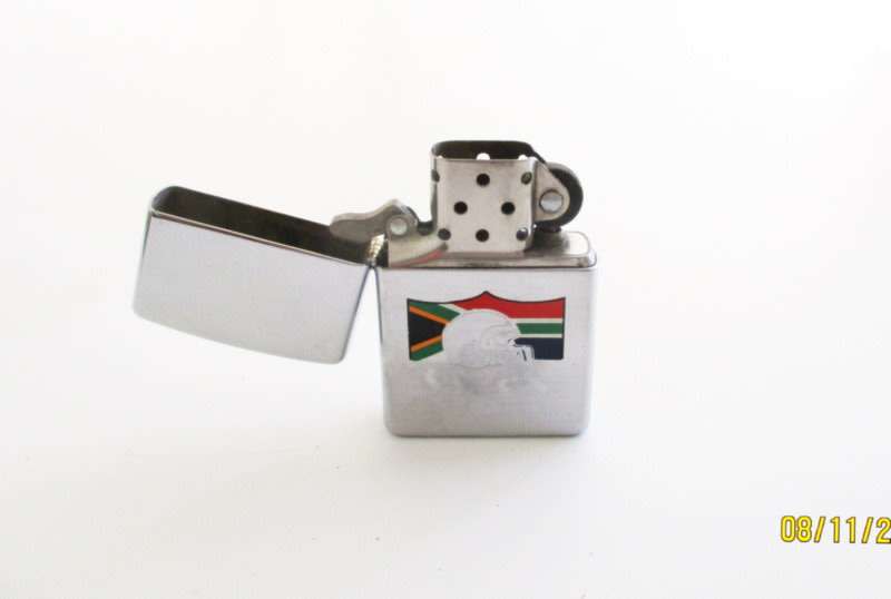 2 ZIPPO LIGHTERS-Check your load shedding times