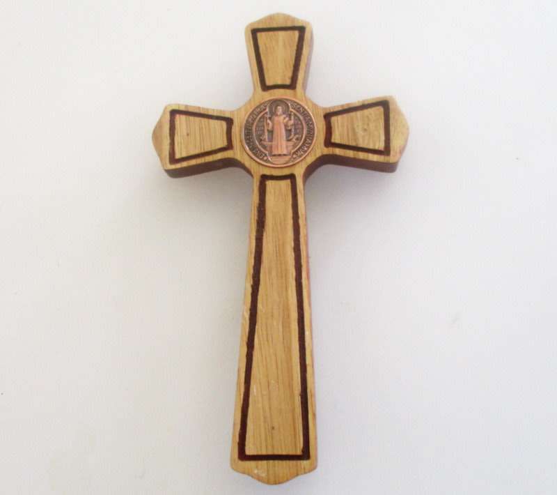 A WOODEN AND COPPER CRUCIFIX