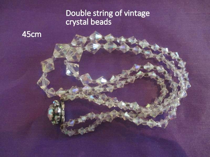 A DOUBLE STRING OF VINTAGE CRYSTAL BEADS