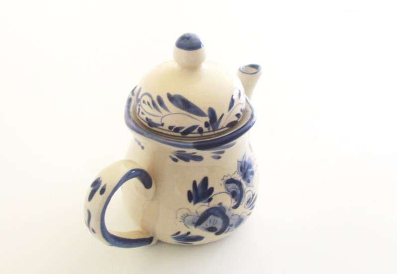 A HAND PAINTED DUTCH TEAPOT AND A DUTCH WALL PLATE--READY TO HANG