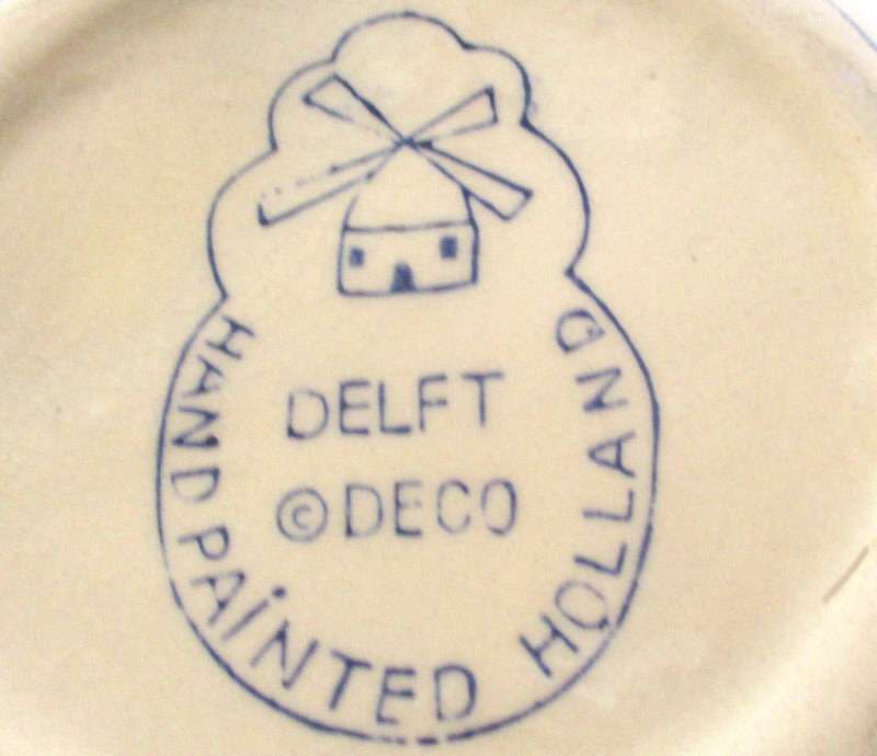 A HAND PAINTED DUTCH TEAPOT AND A DUTCH WALL PLATE--READY TO HANG