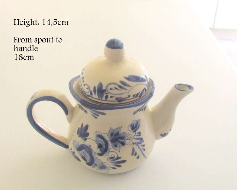 A HAND PAINTED DUTCH TEAPOT AND A DUTCH WALL PLATE--READY TO HANG