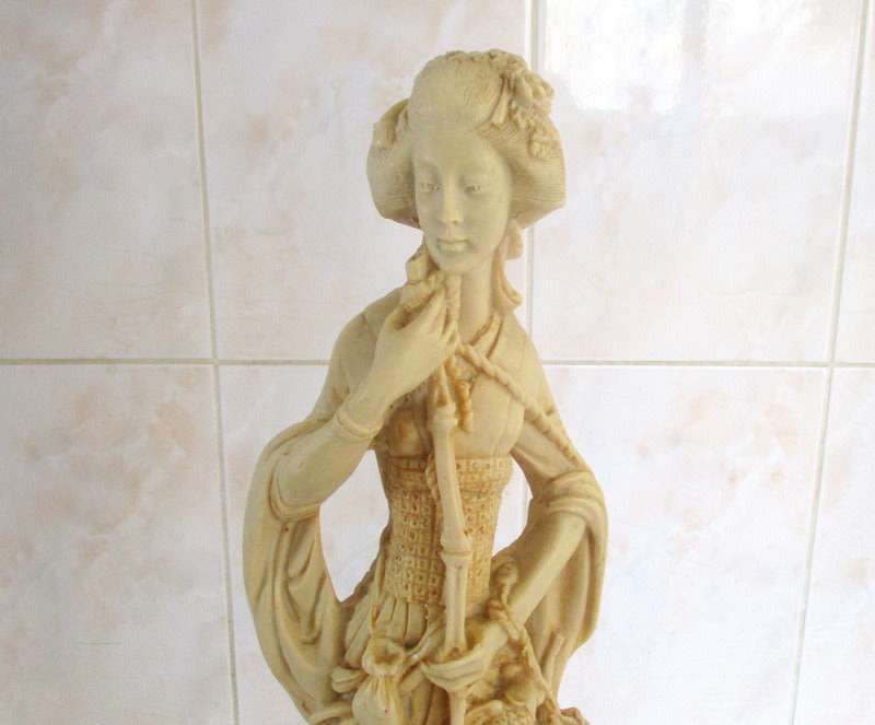A PAIR OF MAN AND LADY ORIENTAL STATUES SIGNED---PERFECT