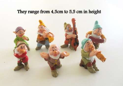 A SET OF DISNEY SNOW WHITE`s SEVEN DWARFS----NO SNOW WHITE