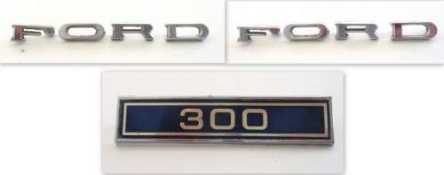 2 FORD CAR BADGES AND A 300 BADGE