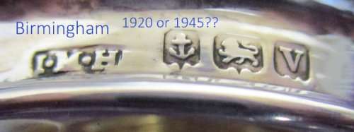 A HALLMARKED SILVER CREAM POT