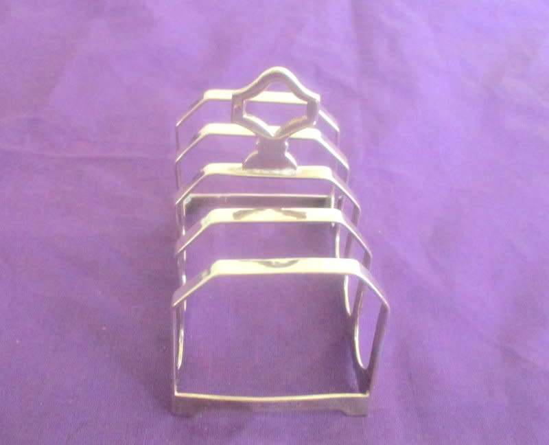 A  HALLMARKED SILVER TOAST RACK---39,8gram