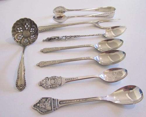 VARIOUS SMALL CUTLERY ITEMS--Rolex spoon,Van Riebeeck,attractive sugar spoon etc.