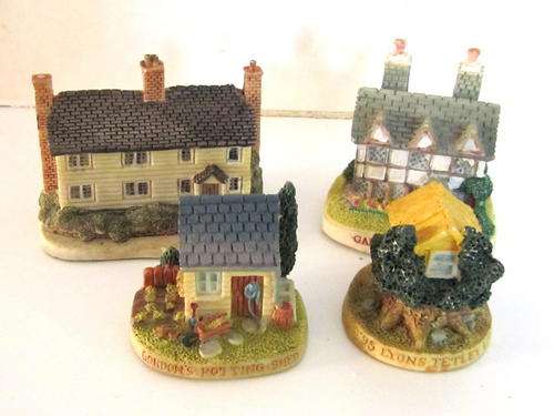 4 SMALL POTTERY HOUSES--Note sizes