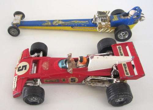 2 CORGI'S FROM 1969--- A FERRARI 312 AND A QUARTERMASTER DRAGSTER.