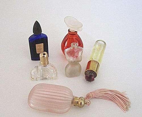 A LOT OF UNUSUAL PERFUME BOTTLES