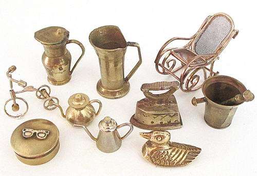 A LOT OF 10 SMALL BRASS ORNAMENTS---Including a pill box,rocking chair and bicycle