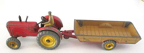 A VINTAGE DINKY MECCANO MASSEY HARRIS TRACTOR AND A HALSOWEN TRAILER --1950's