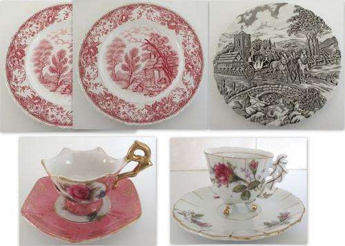A COFFEE CUP ON THREE FEET 3 SIDE PLATES AND A MINIATURE CUP AND SAUCER