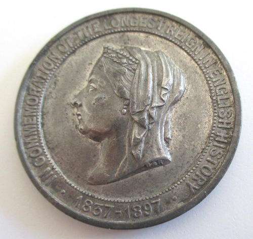 A 60 YEAR VICTORIAN COMMEMORATIVE MEDALLION 1837-1897