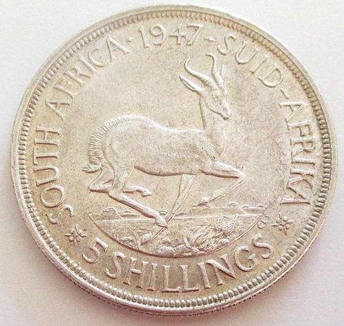 A 1947 SOUTH AFRICAN ,800 SILVER 5/-