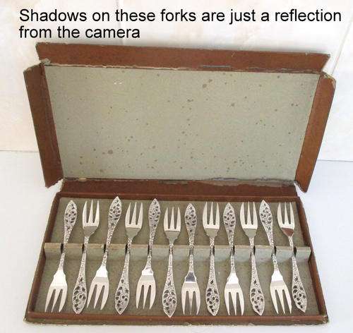 A SET OF 12 BOXED SMALL DUTCH FORKS