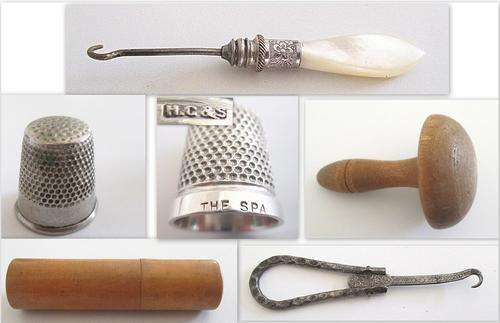 A STERLING SILVER THIMBLE,VICTORIAN MOTHER-OF-PEARL BUTTON HOOK AND OTHER SEWING COLLECTABLES