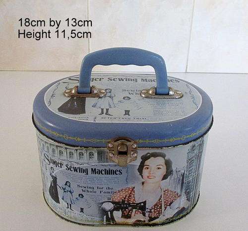 AN OLDE WORLD REPRODUCTION TIN --In the form of a case--Singer sewing box