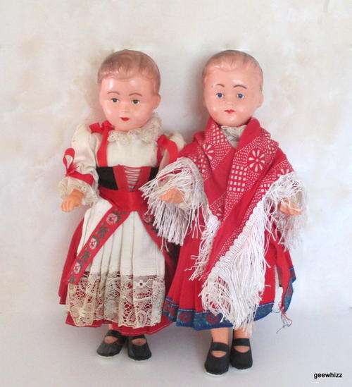 2 X HARD PLASTIC WELL MADE SWISS DOLLS