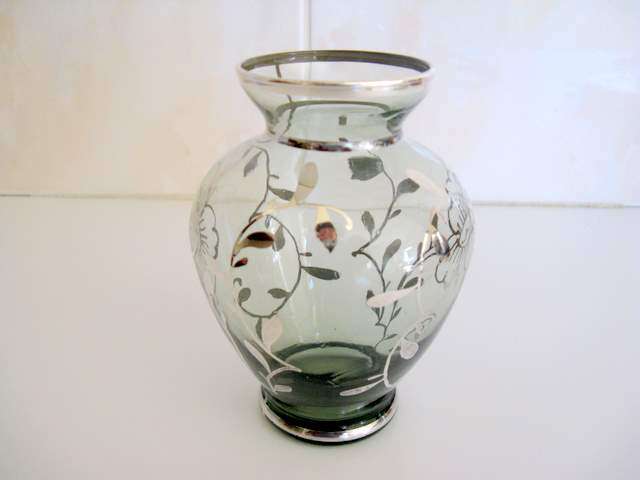 A SMALL GLASS VASE WITH STERLING SILVER OVERLAY