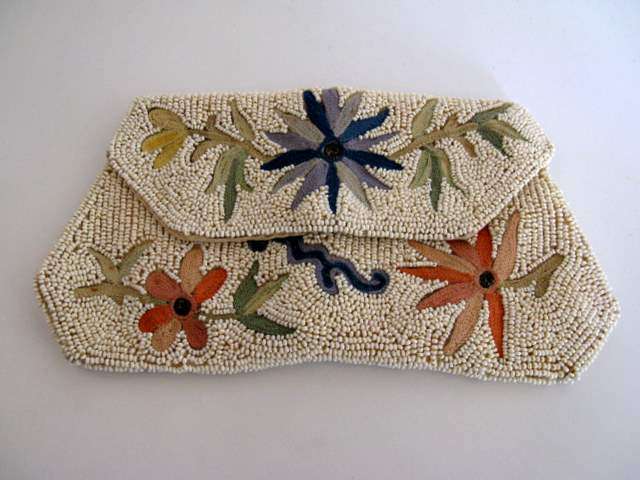 A VINTAGE EVENING BAG --BEADED AND EMBROIDERED.