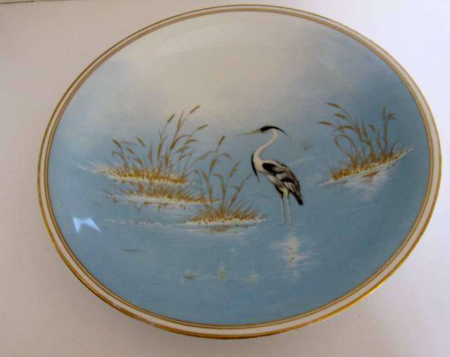 A ROSENTHAL BOWL WITH BIRD