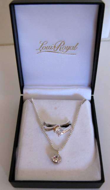 A SET OF PLATED LOUIS ROYAL JEWELLERY--A ring and pendant on chain.