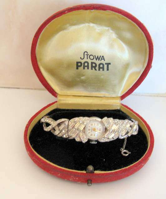 A DIAMANTE WATCH--A SWISS Mona