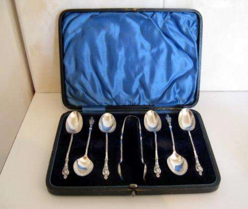 A SET OF SILVER PLATED APOSTLE SPOONS AND SUGAR SNIPPER --Boxed