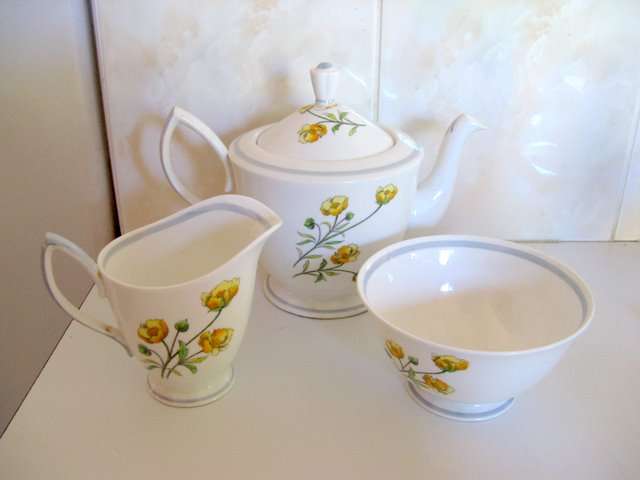 A ROYAL ALBERT TEAPOT,SUGAR BASIN AND MILK JUG--PLEASE READ BEFORE BIDDING