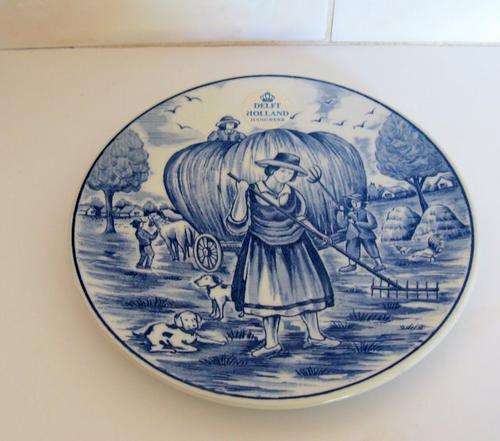A DELFT BLUE AND WHITE WALL PLATE