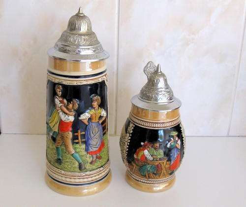 2 CERAMIC GERMAN TANKARDS---Note