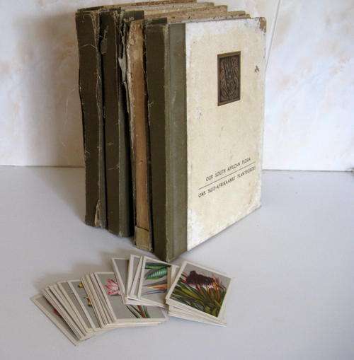 4 ALBUMS OF CIGARETTE CARDS