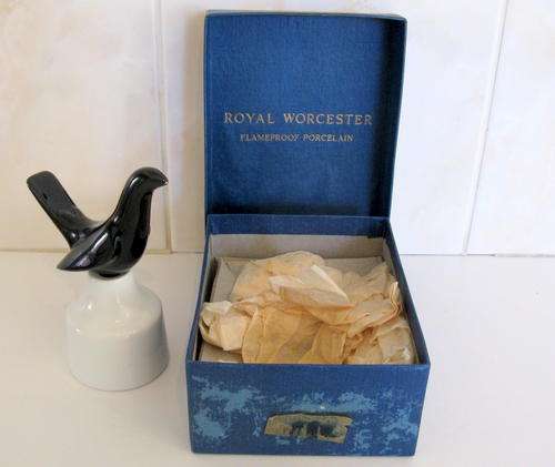 A ROYAL WORCESTER PIE FUNNEL--Four and twenty black birds baked in a pie