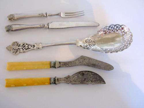 A LOT OF INTERESTING CUTLERY ITEMS--Including a very attractive serving spoon--worth replating