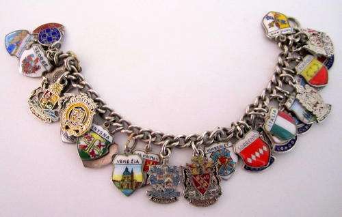 A WORLD CREST BRACELET--SILVER AND E.P.N.S----READ DESCRIPTION.