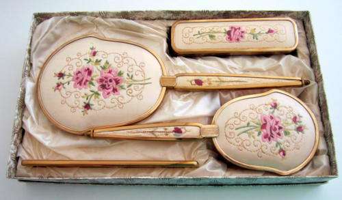 A VINTAGE DRESSING TABLE SET----BOXED